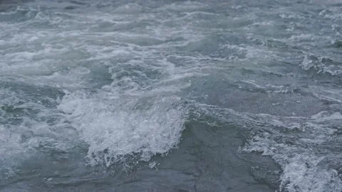 Close up view of sea wave with foam on coast in Catalonia Stock Footage 143104434