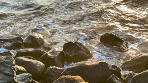 Close Up View of Sea Waves and White Foam Crashing Stock Footage 345953820