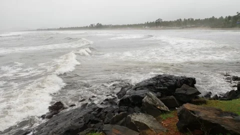 Close view of sea waves striking large rocks Stock-Footage 191416849