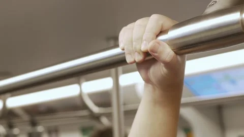 Close up view with selective focus of a looped handle handrails hold in sub.. Video stock 293928169