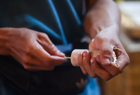 Close Up View of Seller Preparing Es Potong Inserting Wooden Stick into Ice B Stock Photos