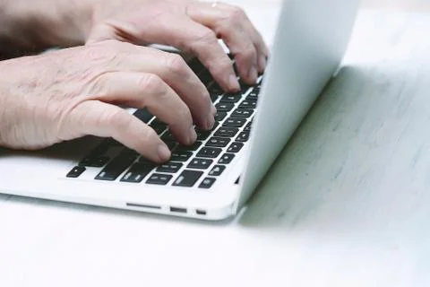 Close up view of senior with computer laptop Stock Photos