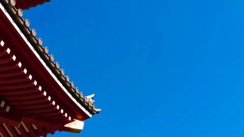 Close-up view of the Senso-ji tiled roof under a blue clear sky Stock Photos