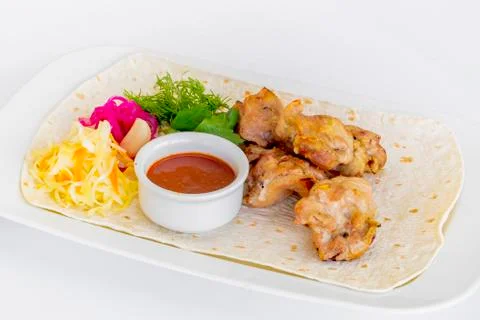 Close up view on served cooked on the grill chicken. shashlik or barbecue mea Stock Photos
