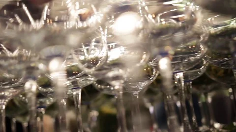 Close-up view on set of glasses with salad on high legs with blur bokeh. 스톡 동영상 72603228