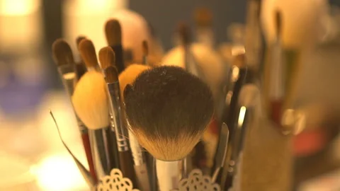 Close-up view of the set of professional make-up brushes and other tools on the Stock Footage 159421178
