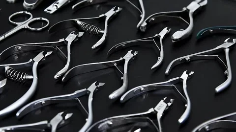 Close up view of set of various stainless steel instruments in dental clinic Video stock 222585954