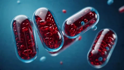 Close-up view of several transparent capsules filled with numerous small Stock Footage 297496223