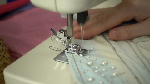 Close up view of sewing process in slow motion Stock Footage 100131275