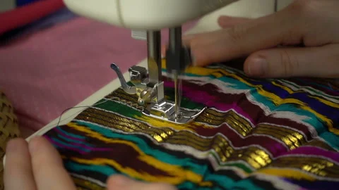 Close up view of sewing process in slow motion Stock Footage 100131328