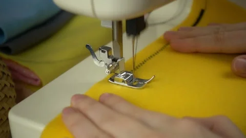 Close up view of sewing process in slow motion Stock Footage 100131629