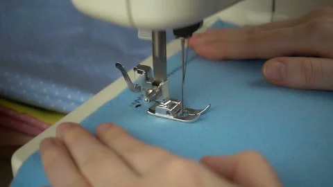 Close up view of sewing process in slow motion Stock Footage 100131659