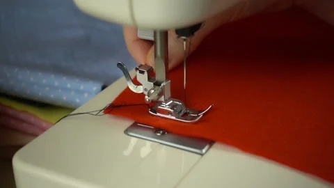 Close up view of sewing process in slow motion Stock Footage 100131705