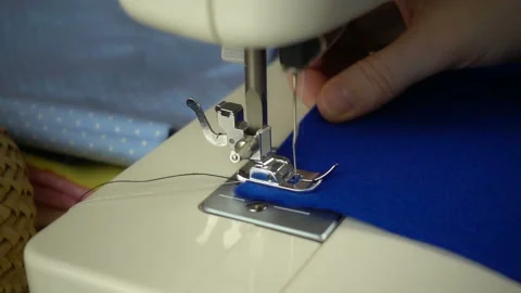 Close up view of sewing process in slow motion Stock Footage 100131811