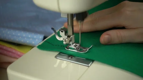 Close up view of sewing process in slow motion Stock Footage 100132098