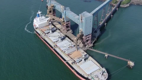 Close View Of Ship Loading Grain Crops On Bulk Freighter Via Trunk To Cargo Ship Stock Footage 172415715