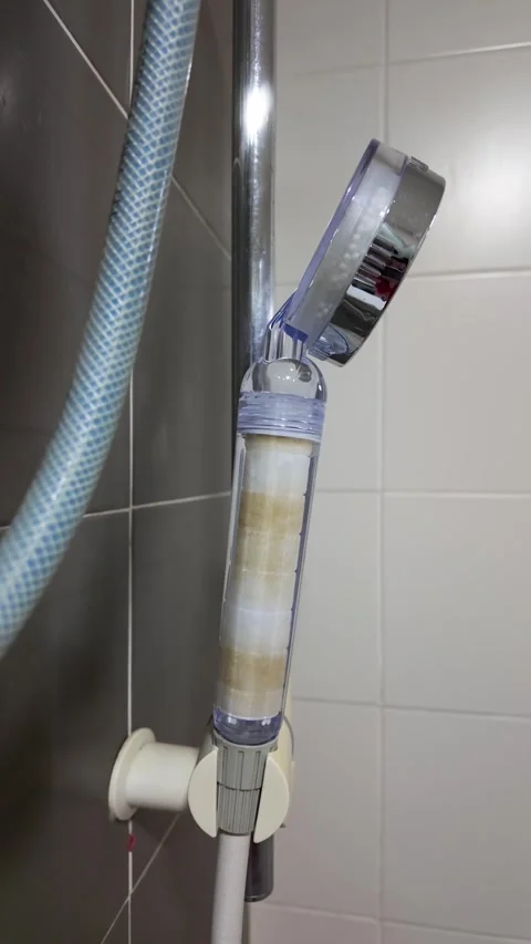 Close-up view of the shower head filtration system in the bathroom Видео 321634834