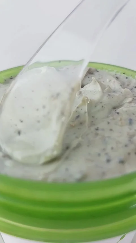 Close up view showing the soft and spongy texture of white mung bean porrid.. Stock Footage 330749360