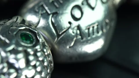 Close up view shows details of a metallic object with a textured design Stock Footage 328592726