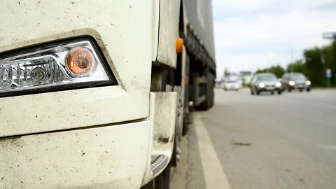 Close-up view shows a left turn signal from the left side of a truck Stock Footage 271026333