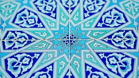 A close-up view shows a section of decorative ceramic tiles featuring intri... Stock Footage 339305629