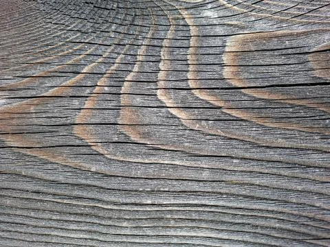 Close up view shows weathered texture and grain patterns of dark wooden pla.. Stock Photos