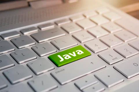 Close-up view on silver conceptual keyboard - Java key 库存照片