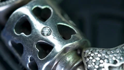 Close-up view of a silver star-shaped object with detailed surface design Stock Footage 328592779