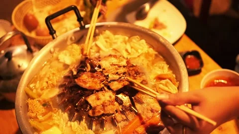 Close Up View of Sizzling and Steaming Shabu Dish Cooking, Authentic Hot Pot Stock Footage 294743612
