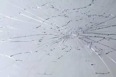 Close-up view of slanted broken lcd screen with visible pixel grid and select 写真素材