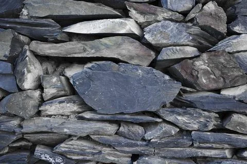 Close up view of slate wall texture and background .   stone wall texture Stock Photos