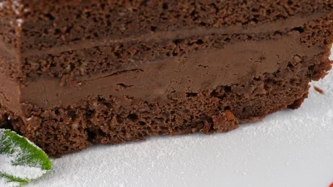 Close-up view, slice of chocolate layer cake Video stock 79985392