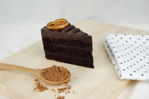 Close up view of sliced chocolate cake on top with pretzel Stock Photos