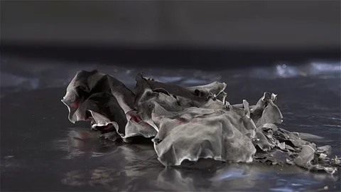 Close-up View of Slow Motion Money Ash Stock Footage 72428097