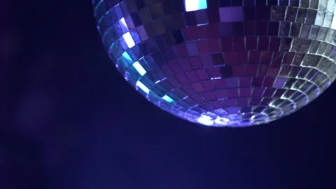 Close-up view of slowly rotating disco mirror ball Stock-Footage 157842486