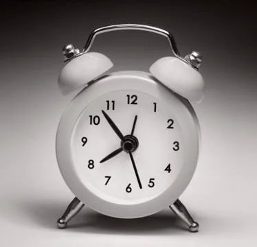Close view of small clock i Stock Photos