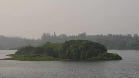 Close view of small island like place at the center of lake Stock-Footage 150718882