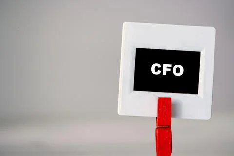 A close-up view of a small sign displaying the term CFO, which stands for Chief Stock Photos