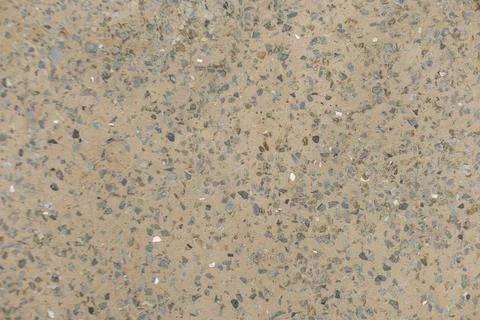 Close up view of small stones embedded in the cement Karlin, Prague Stock Photos