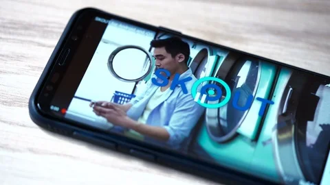 Close up view of the smartphone screen with the Skout app. Stock Footage 117851709