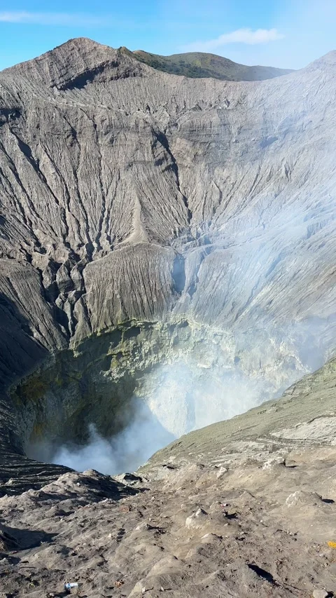Close view of smoking Bromo volcano crater at sunrise on Java island, Indonesia. 動画素材 332756881
