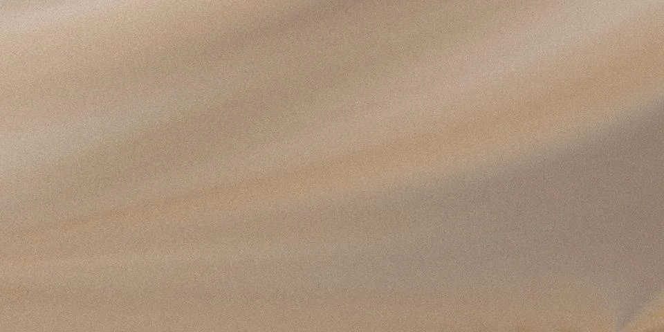 A close-up view of a smooth, light beige textured surface under soft lighting Ilustração Stock