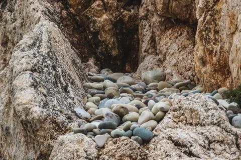 A close up view of smooth polished multicolored stones Stock Photos