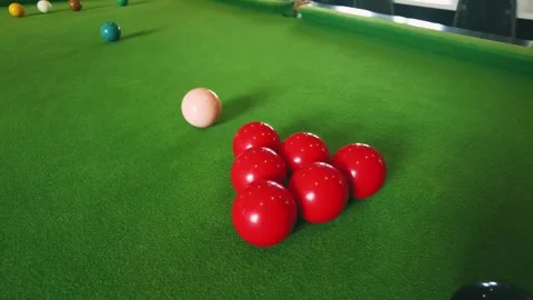 Close-Up View of Snooker Balls on Green Felt Table with Focus on Red Balls .. Stock Footage 327946504