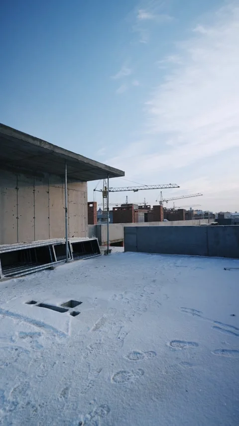 Close-up view of snow-covered rooftop on urban building. Stock Footage 327842347