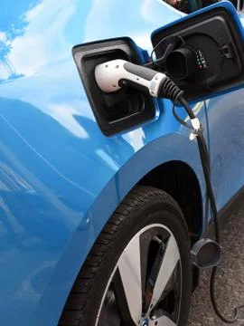 Close-up view of sockets for charging a blue electric car Stock Photos