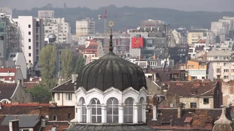 Close-up view of Sofia Synagogue dome with city buildings on a sunny autumn day Video stock 328477784