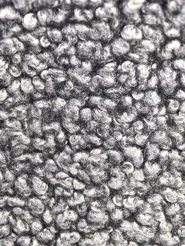 Close-up view of soft gray fabric with a textured, fluffy surface 写真素材