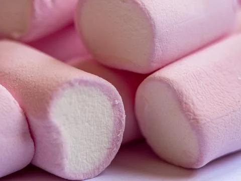 Close-up view of soft pink marshmallows stacked in casual arrangement. fluf.. Stock Photos