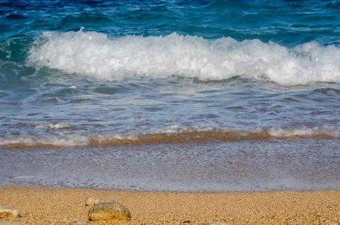 Close Up View Soft Waves Gently Washing Over Sandy Beach Relaxing Coastal Beauty Stock Photos